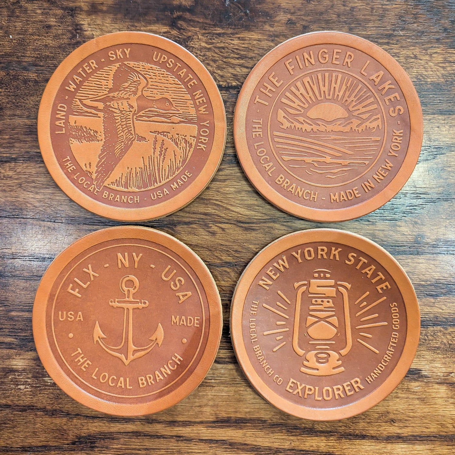 The Local Branch Leather Multi Pack: Mallard/Anchor/Lantern/Sunrise / Caramel Leather Coasters