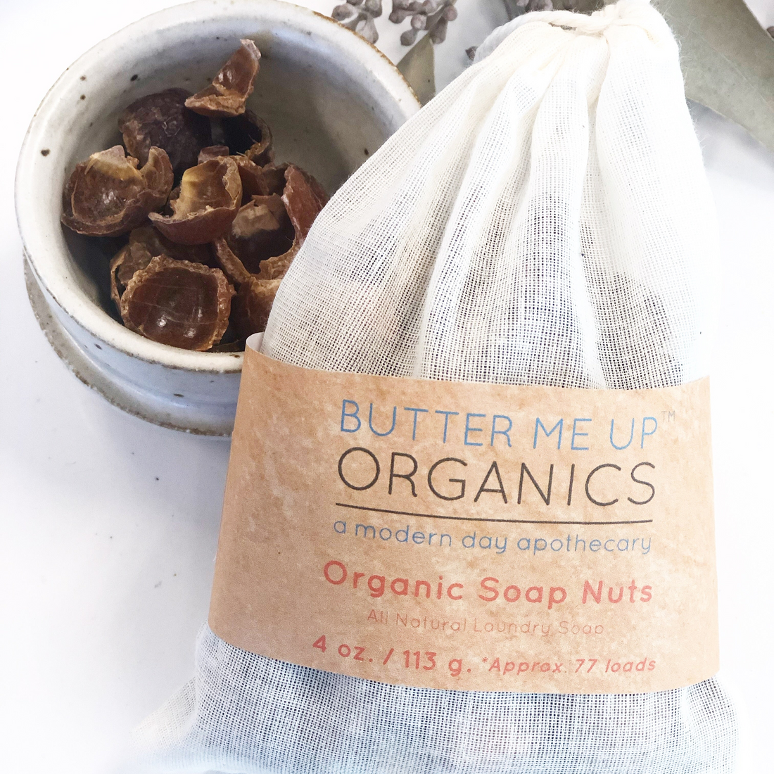 Bag of Organic Soap Nuts with a label on a white surface