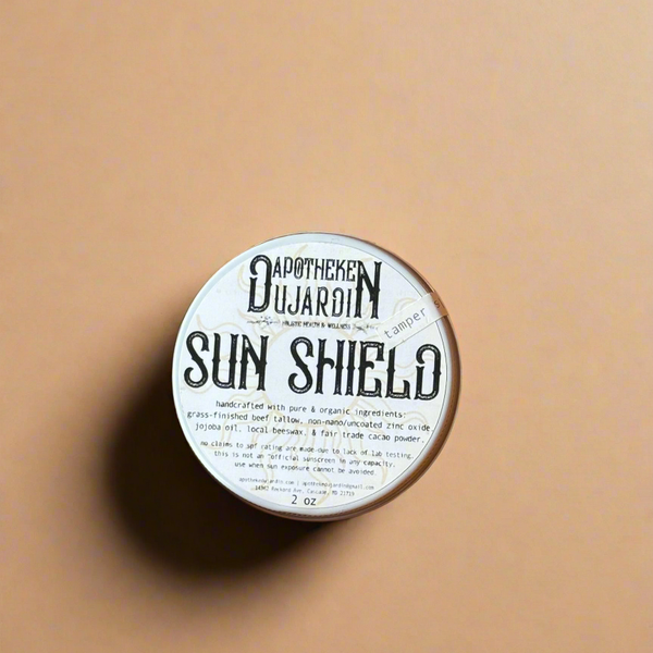 Round container labeled &