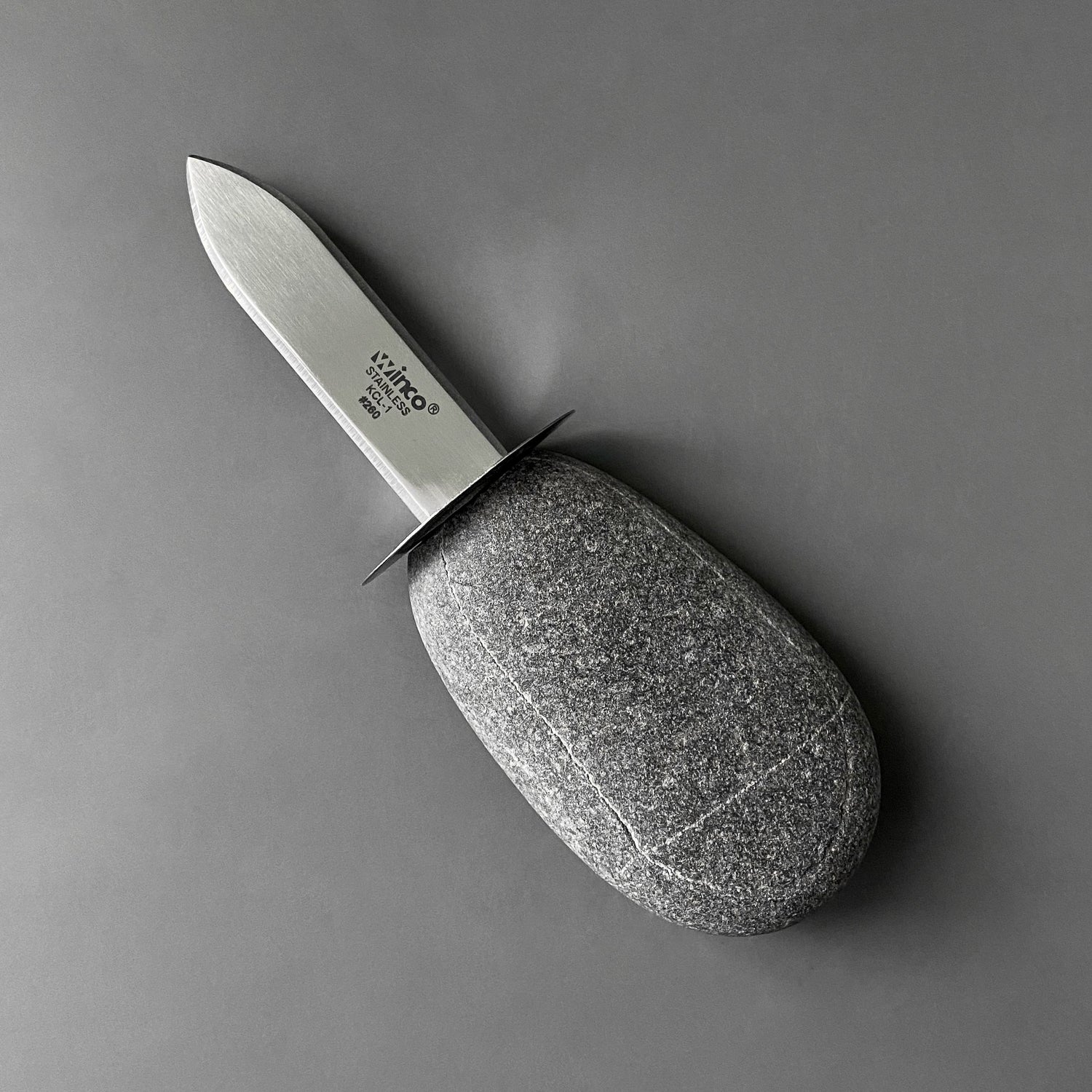 Stone Clam Shucker