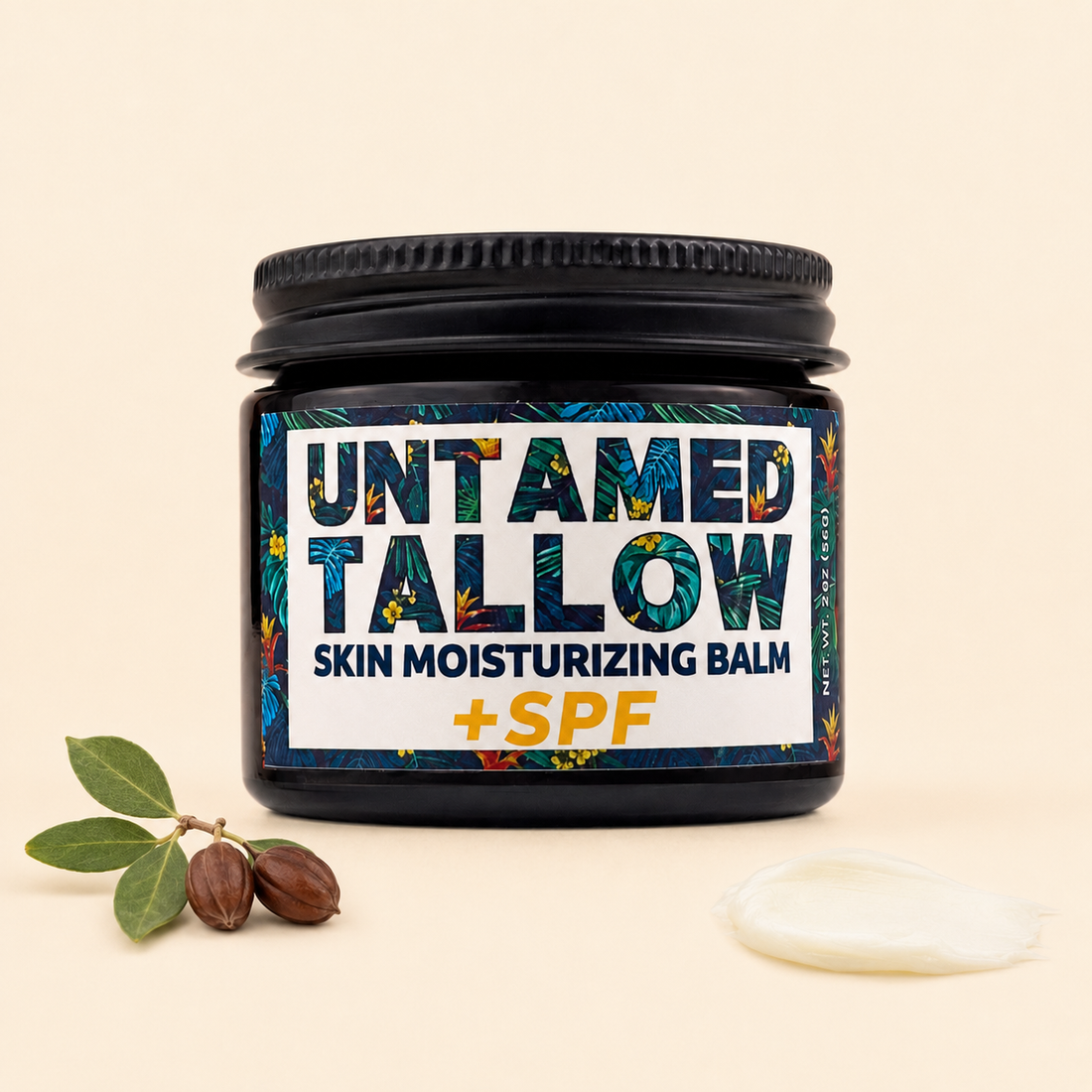A jar of Untamed Tallow Skin Moisturizing Balm with SPF, shown on a light beige background with a small green leafy sprig and two brown nuts on the left, and a dollop of white balm on the right.