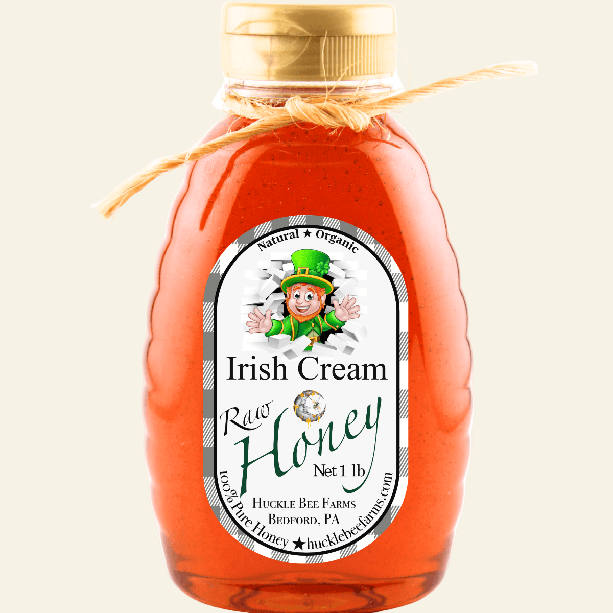 Bottle of Irish Cream Raw Honey with a label on a white background