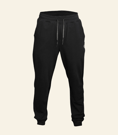 Black jogger pants on a white background
