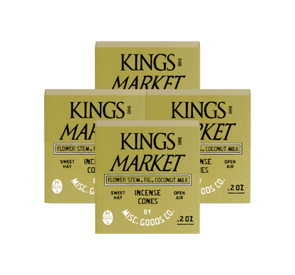 Multiple boxes of Kings Market incense cones on a white background