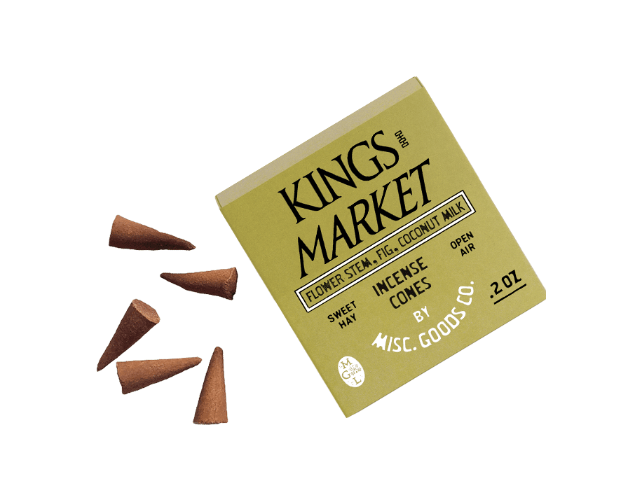 Box of Kings Market incense cones with cones scattered around on a white background