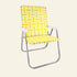 A folding beach chair with a bright yellow and white geometric basketweave patterned sling seat and backrest, supported by a curved silver metal frame.