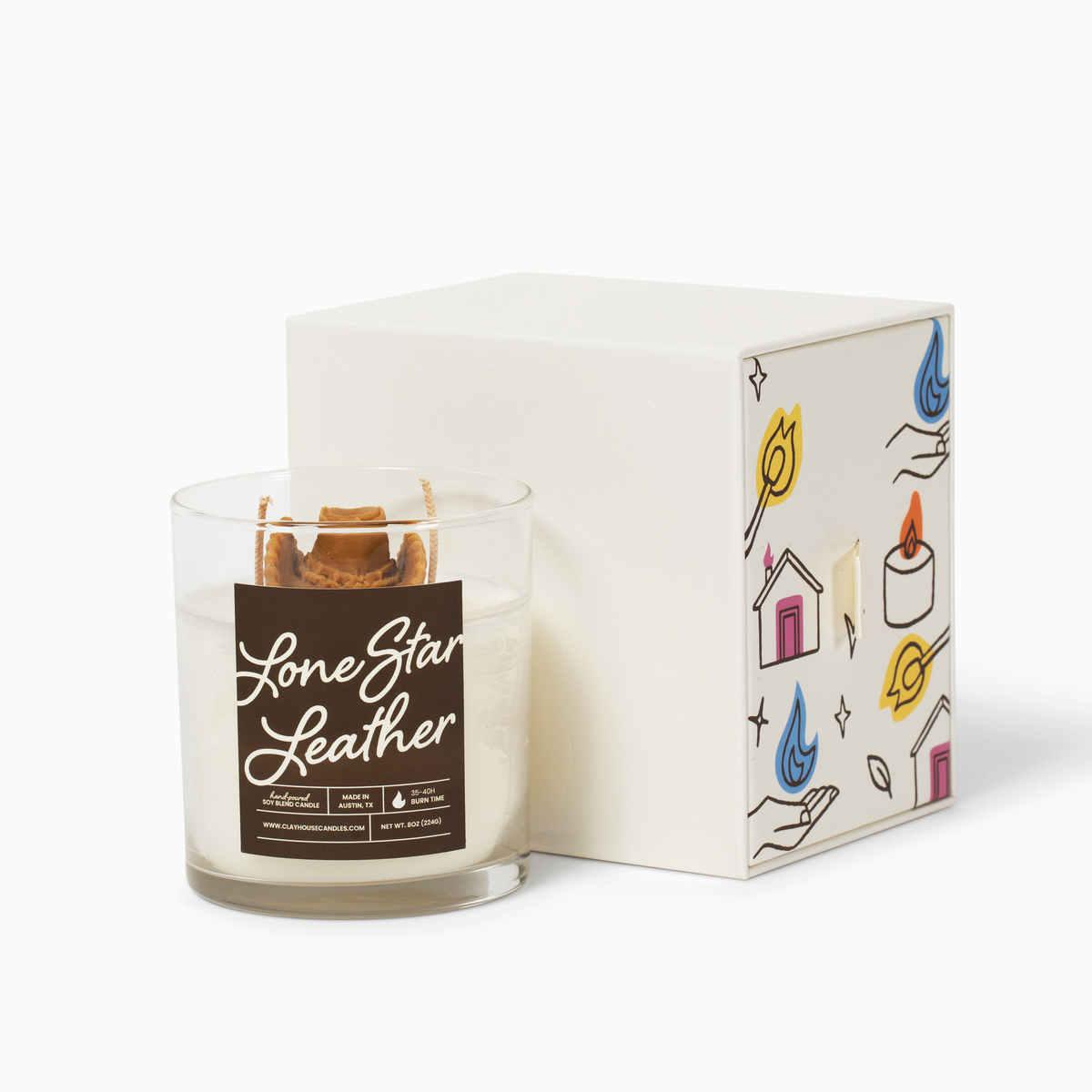 A jar candle labeled &