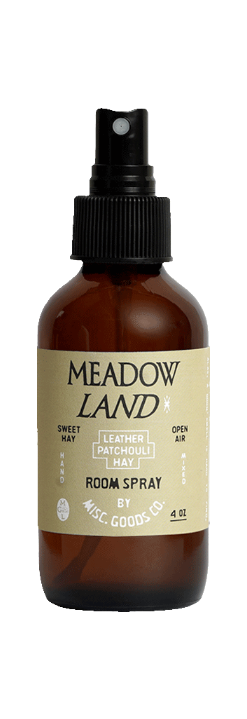 Meadow Land room spray bottle with label on a white background