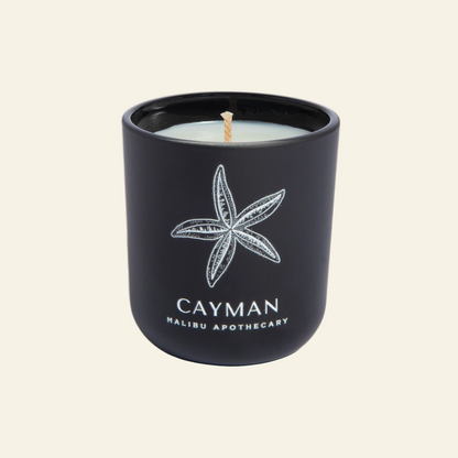 Black candle jar with starfish design and &