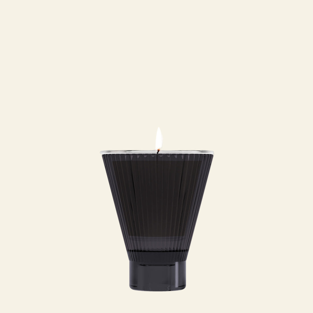 Black textured candle on a white background
