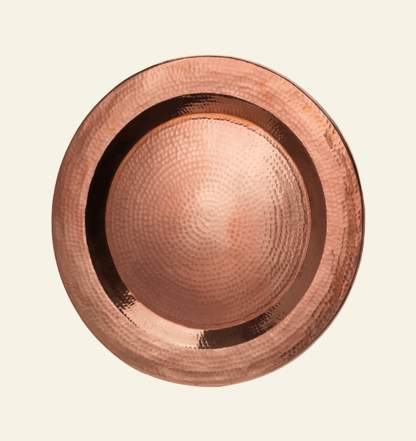 Copper plate with a textured surface on a white background