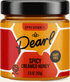 Jar of Pearl Spicy Creamed Honey with a black lid on a white background