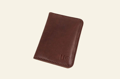 Brown leather wallet on a white background