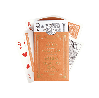 Playing cards with a decorative box labeled &