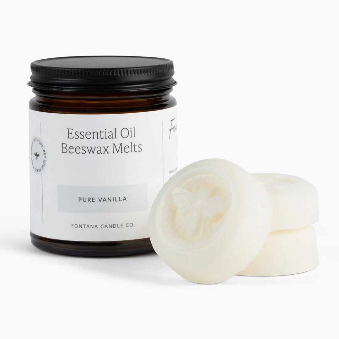 Jar of Fontana Candle Co. Essential Oil Beeswax Melts with two melts on a white background