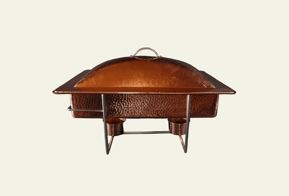 Copper chimney cap on a beige background