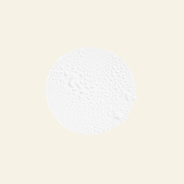 Brown glass bottle with spray nozzle labeled &