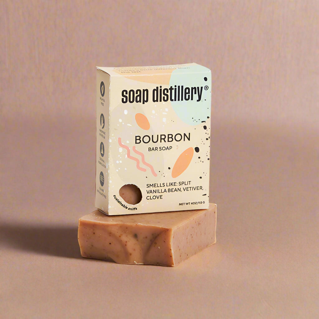 Bar of soap with Soap Distillery packaging on a white background