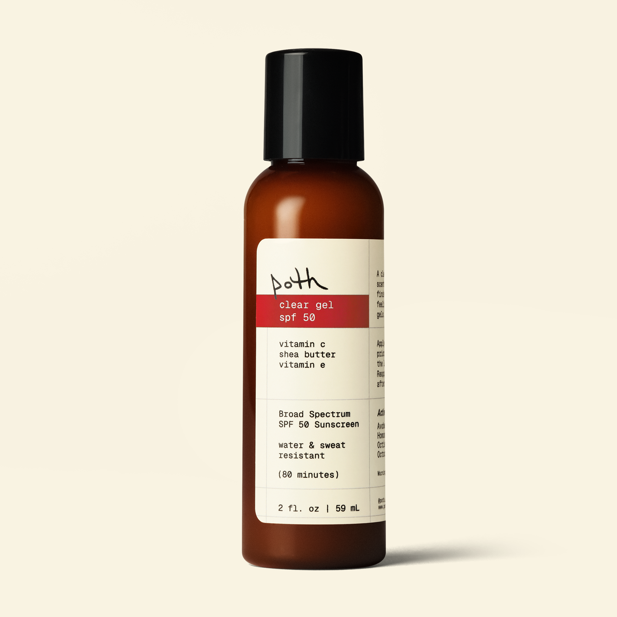A 2 fl. oz (59 mL) bottle of both Clear Gel SPF 50 sunscreen in an amber brown bottle with a black cap and a cream label featuring a red stripe, set against a solid light beige background.
