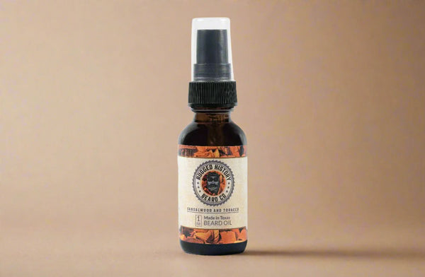 Bottle of beard oil with a label on a brown background