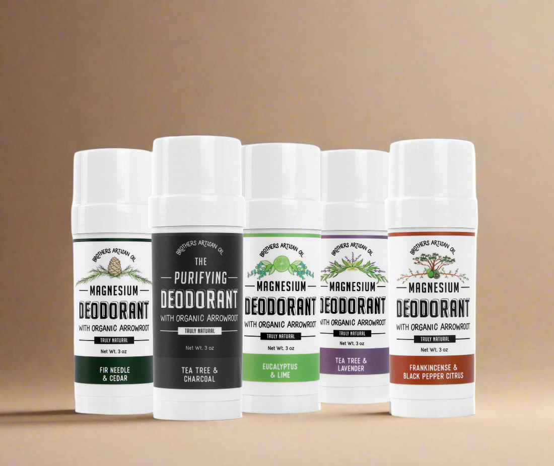 Set of six deodorant sticks with various labels on a white background