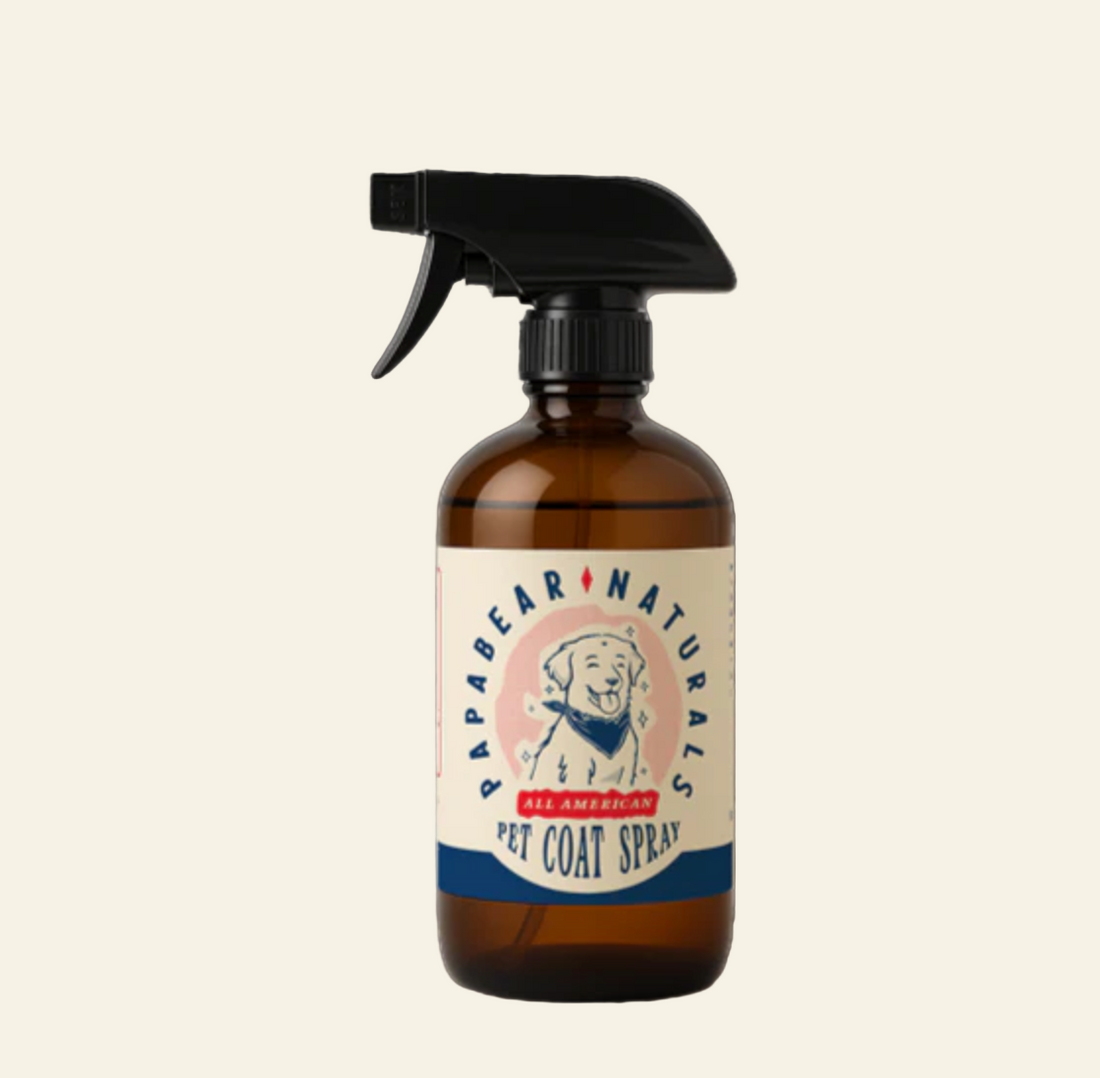 Brown spray bottle with a label on a textured background