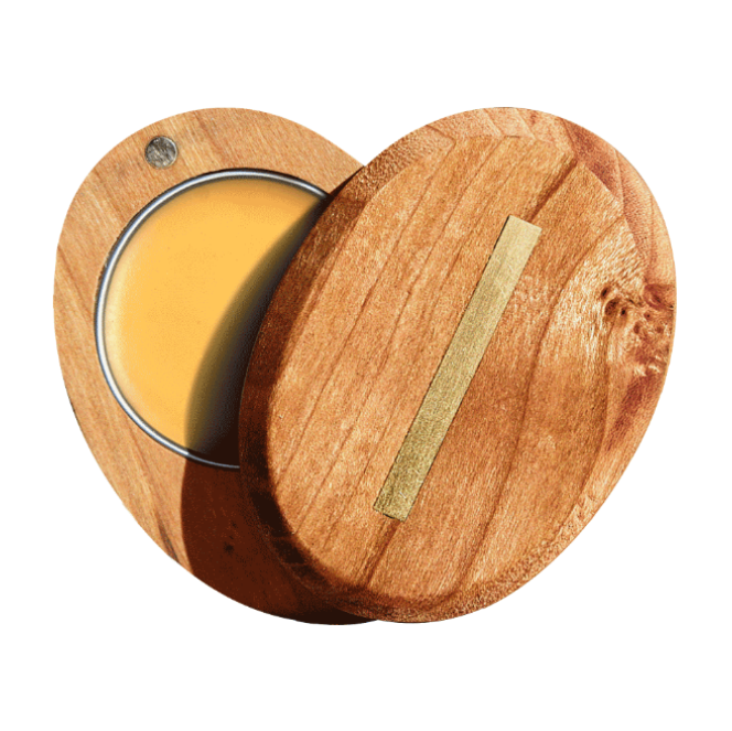 Wooden container with a gold strip and yellow substance inside on a white background