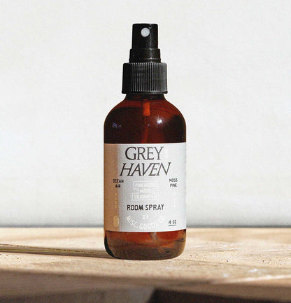 Brown spray bottle labeled &