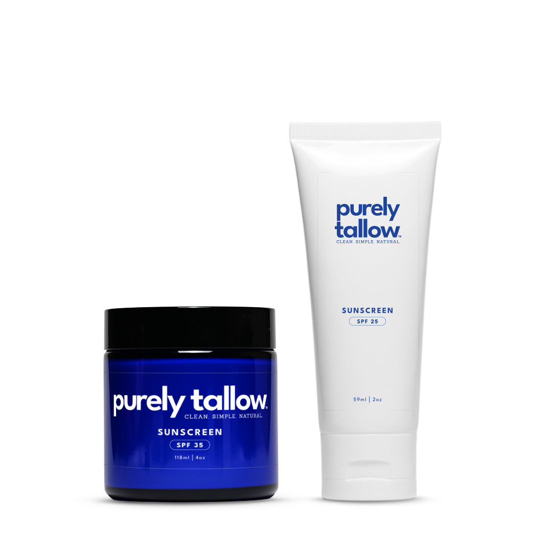 Purely Tallow Clean Shade Special Sunscreen shown in two containers: a small cobalt blue jar with a black lid and a white squeeze tube, both with blue branding, on a white background.