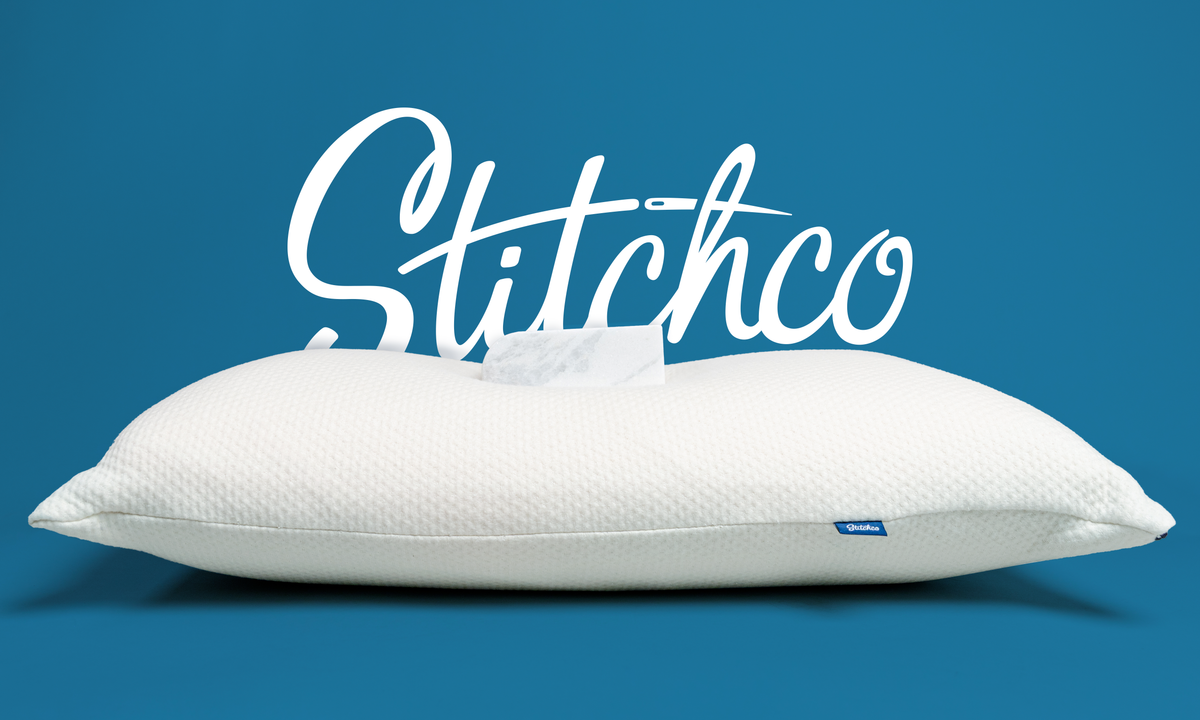 White pillow with &