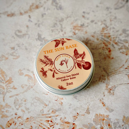 A round metal tin of &