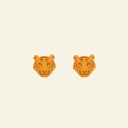 Orange tiger head earrings on a white background