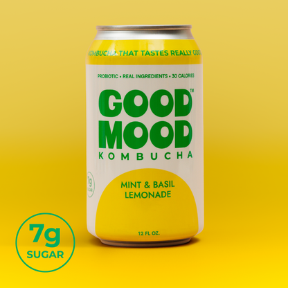 Good Mood Kombucha can with green and yellow design on a yellow background