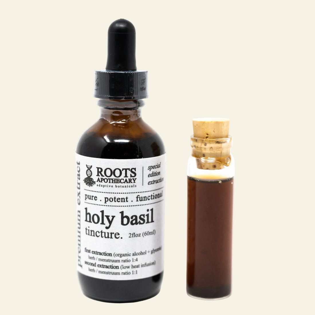 An amber glass dropper bottle labeled Roots Apothecary Holy Basil Tincture next to a small glass vial with a cork stopper containing the dark herbal extract, on a white background.