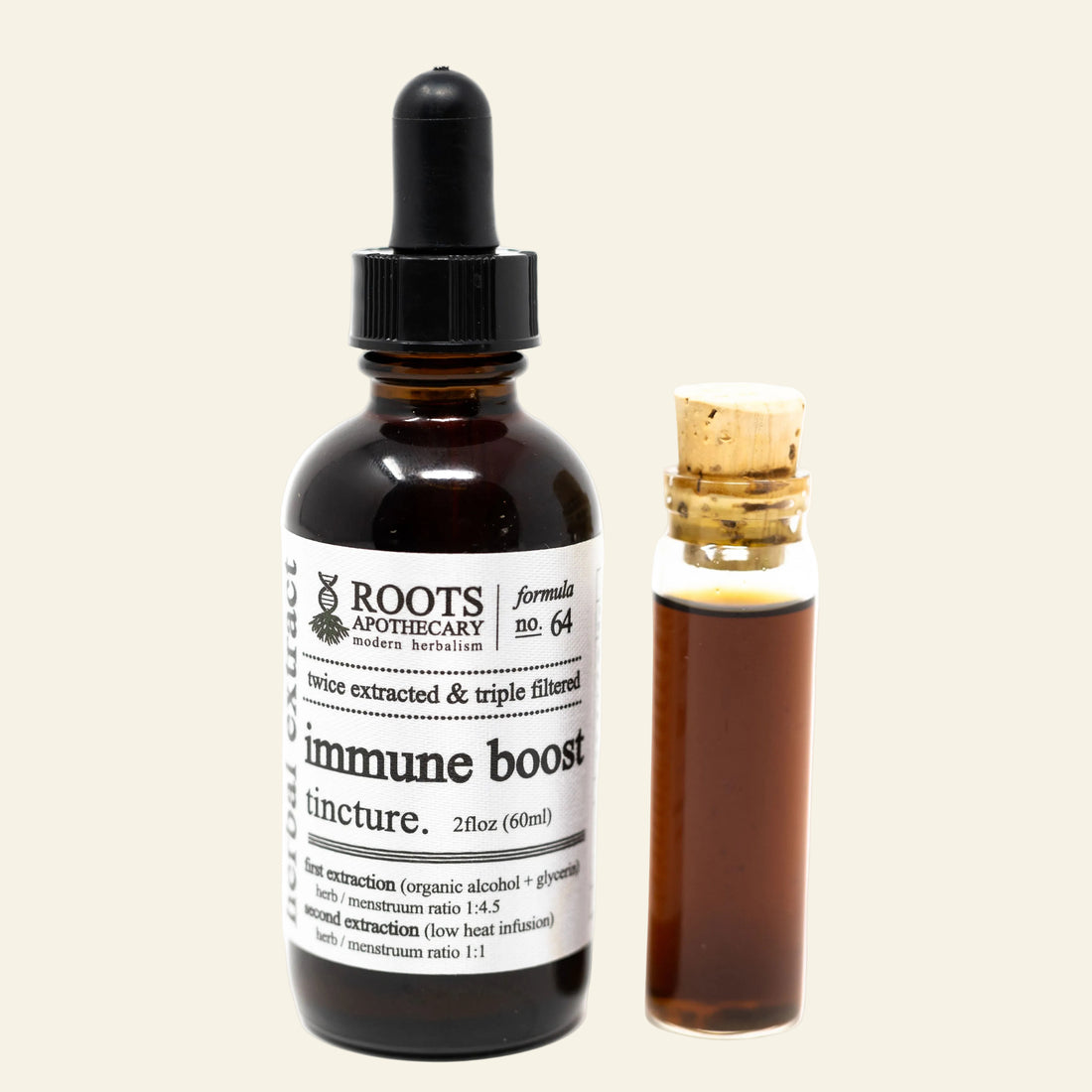 Bottle of immune boost tincture from Roots Apothecary on a white background