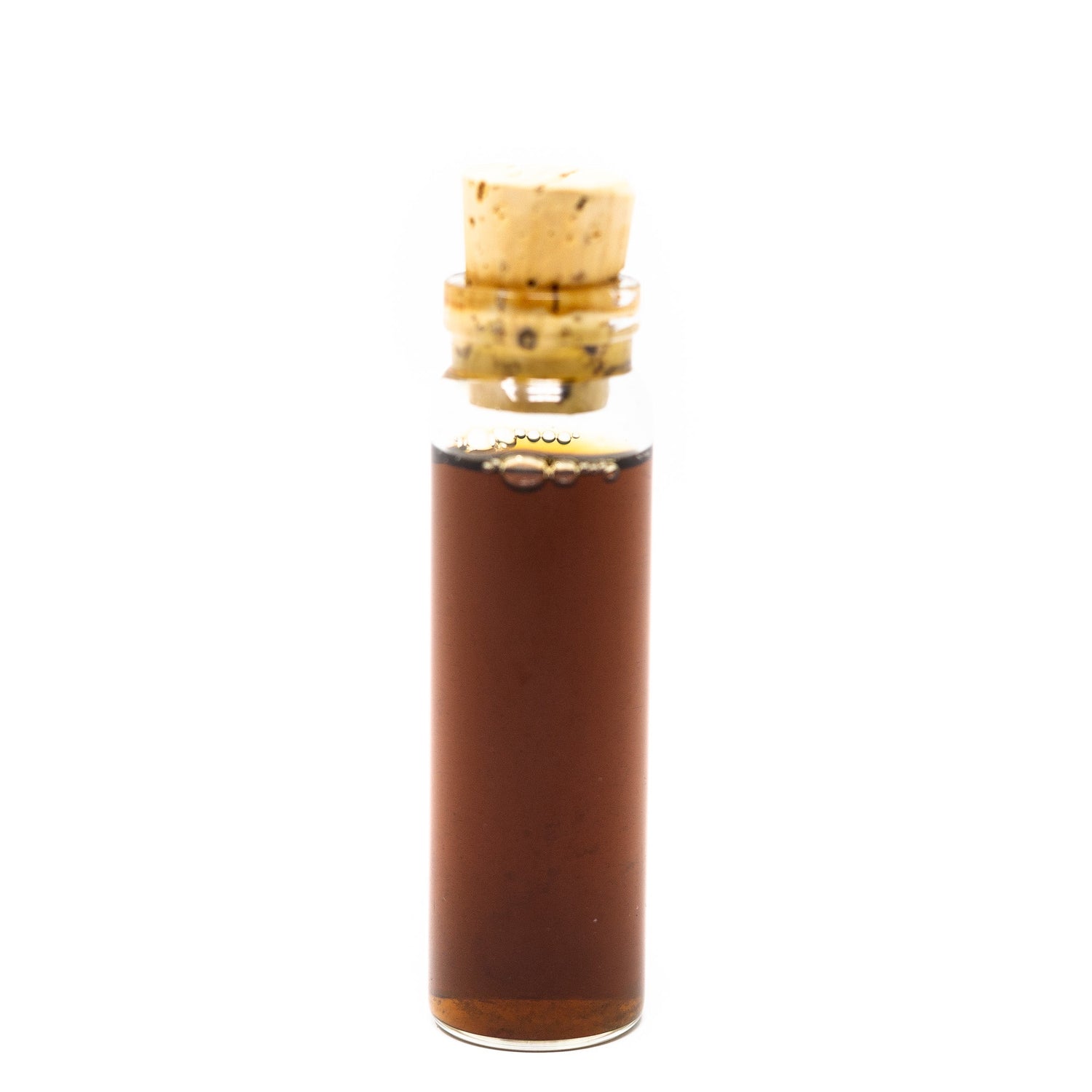 Glass bottle with cork stopper on a white background