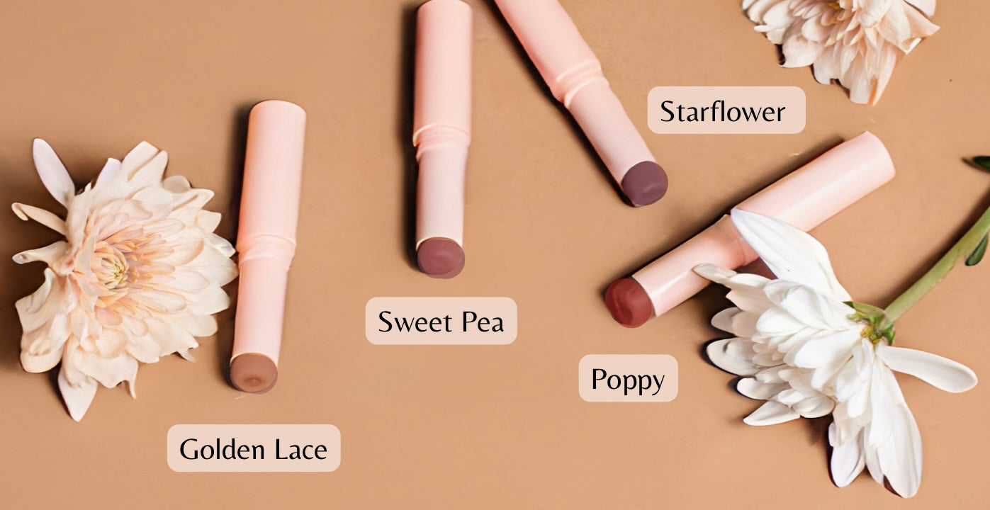Four lipsticks labeled &