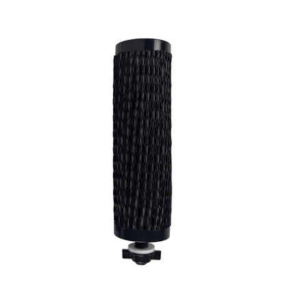 A black cylindrical air filter with a textured honeycomb pattern, featuring black plastic end caps and a mounting plug at the bottom, shown against a plain white background.