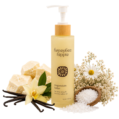 Honeybee Hippie magnesium butter product with vanilla beans, flowers, and salt on a white background
