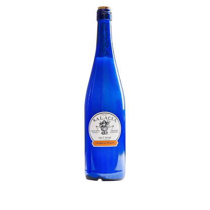 Blue bottle with a label on a white background