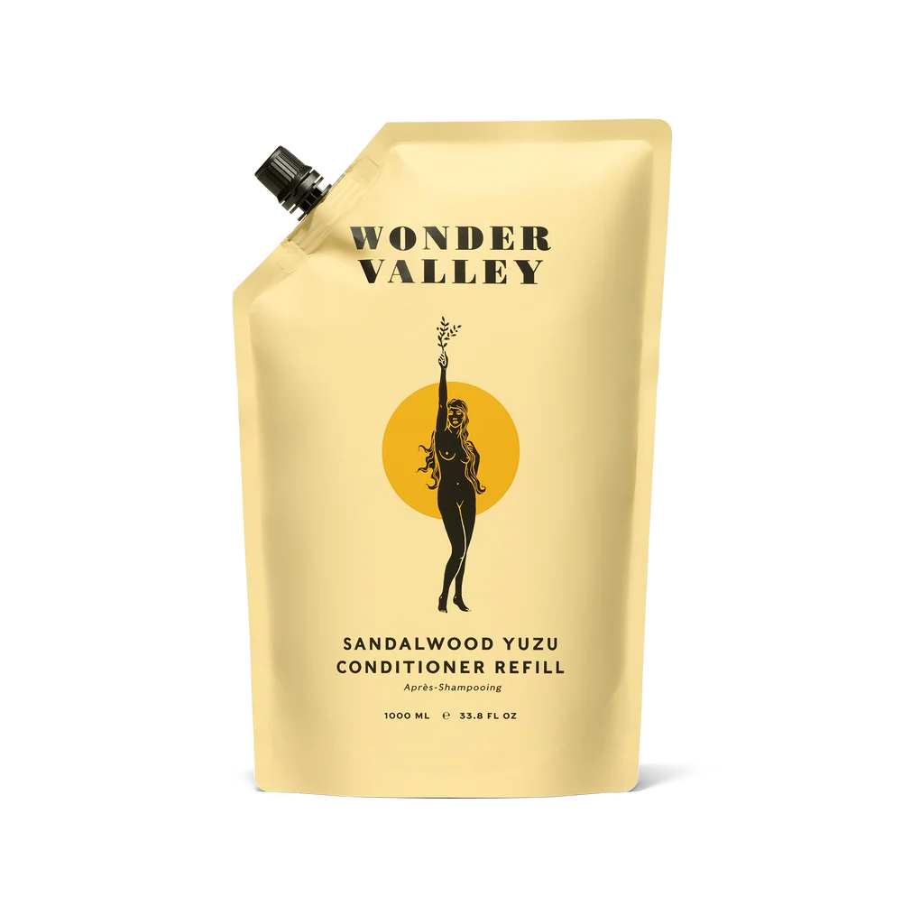 Wonder Valley Sandalwood Yuzu Conditioner Refill in a 1000 mL (33.6 fl oz) stand-up pouch.