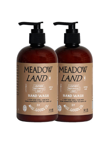 Two bottles of Meadow Land hand wash with pump dispensers on a white background.