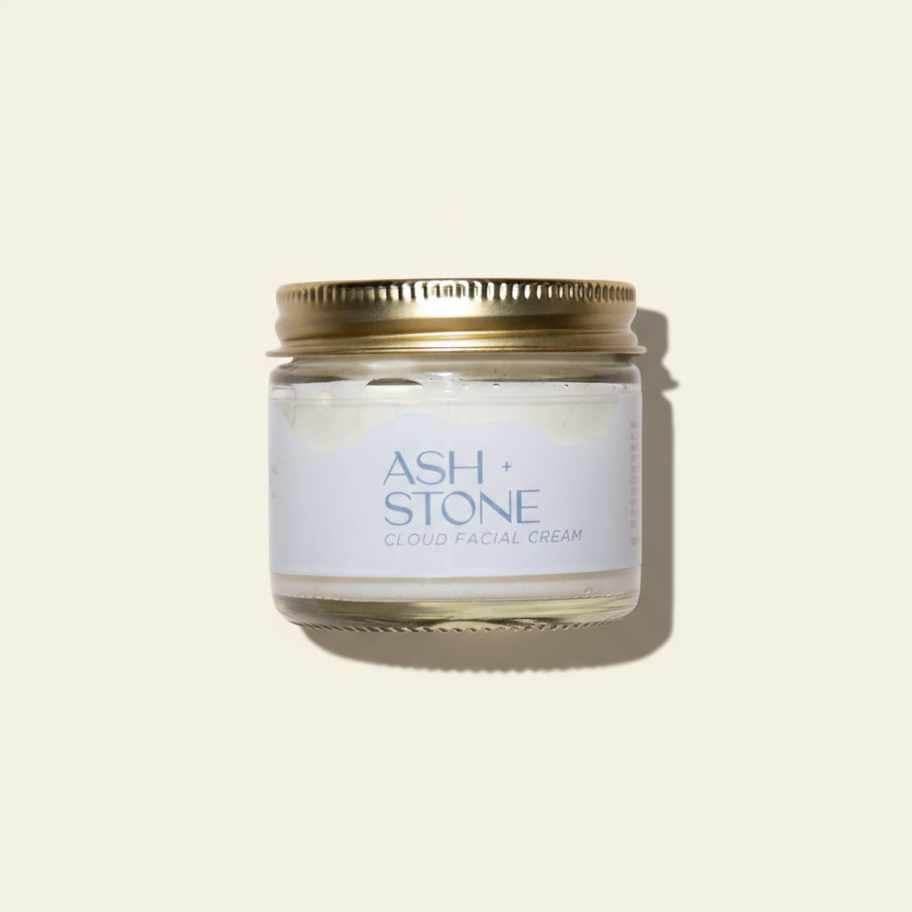 Jar of Ash + Stone cloud facial cream on a white background