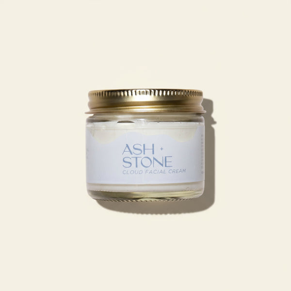 Jar of Ash + Stone cloud facial cream on a white background