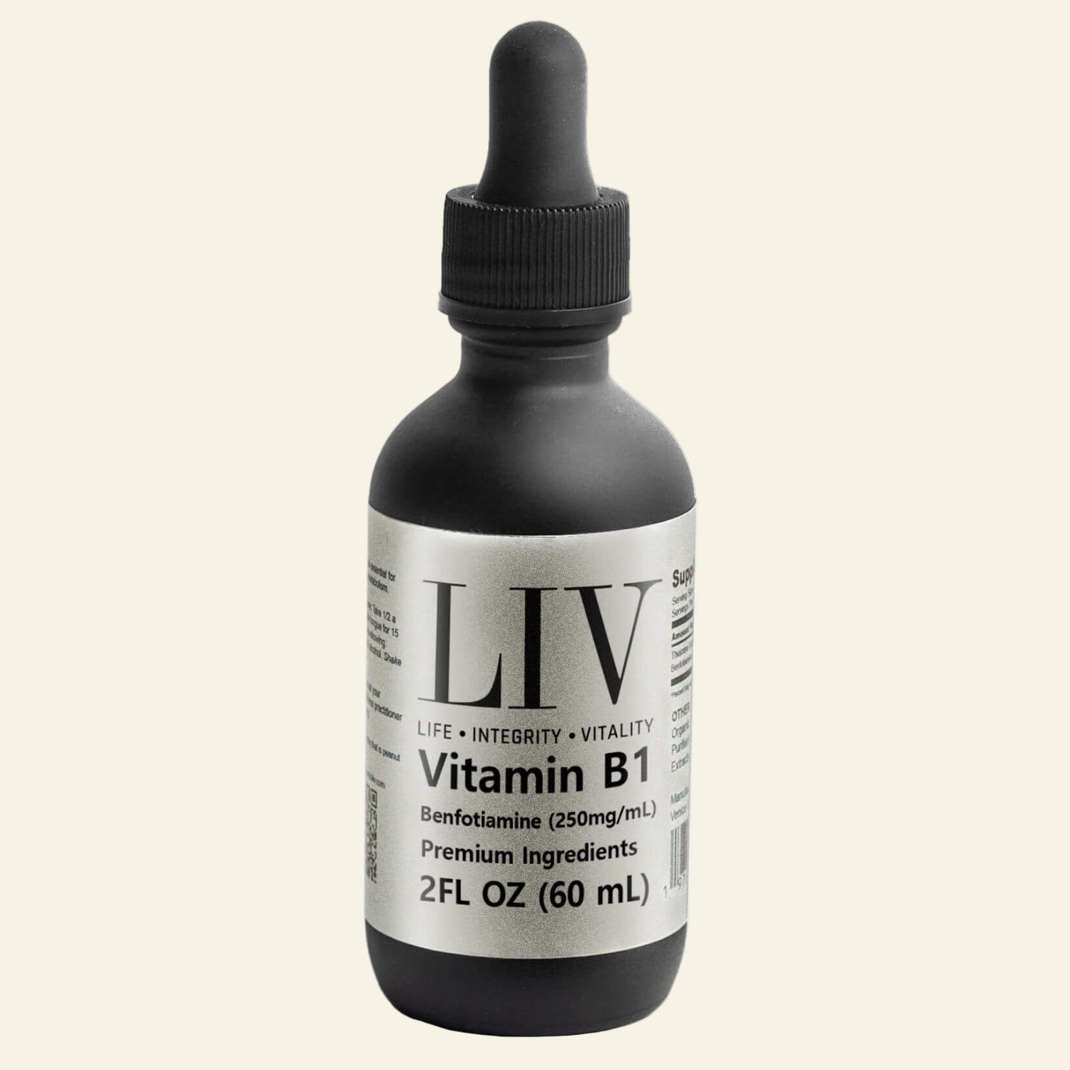Bottle of Vitamin B1 liquid supplement with dropper labeled &