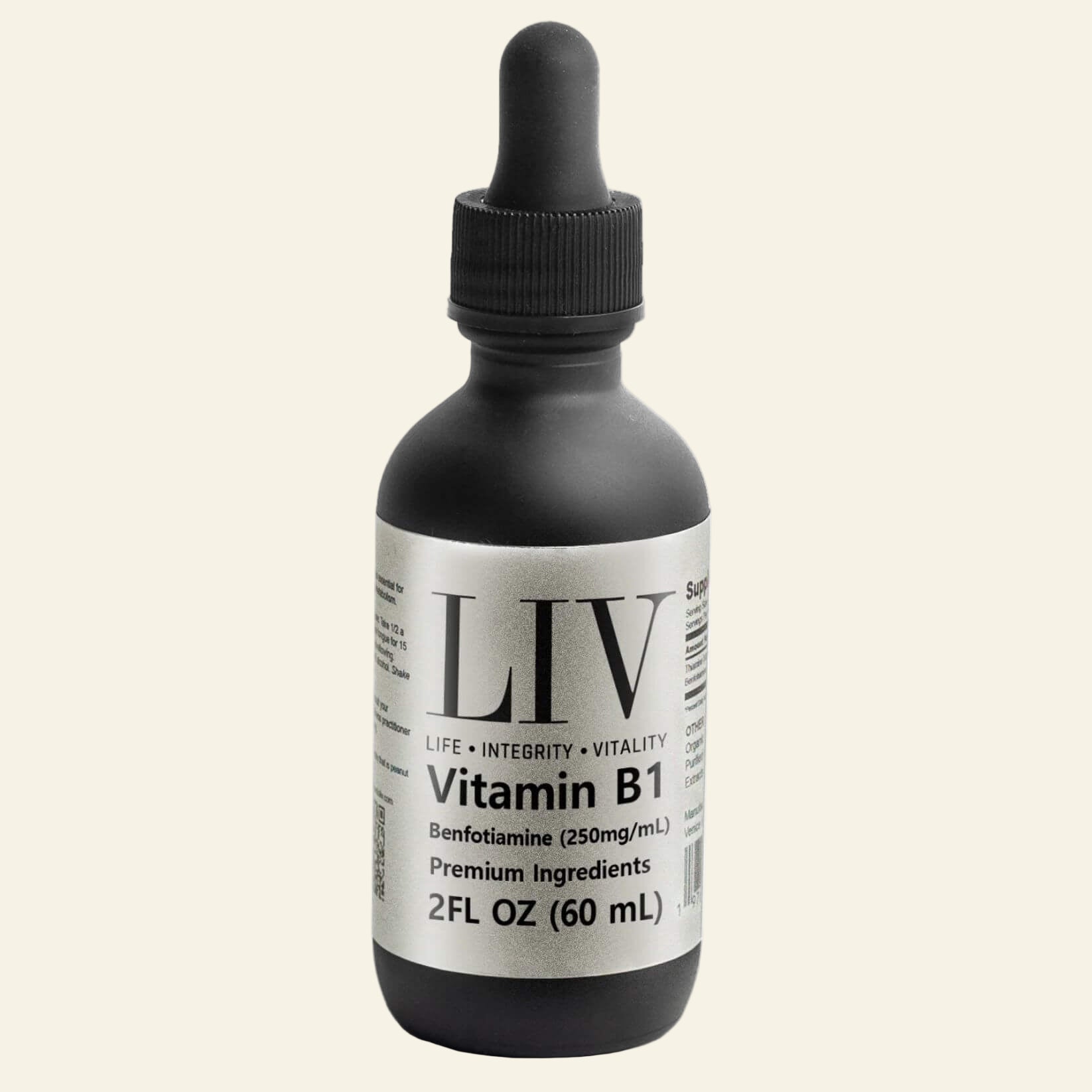 Bottle of Vitamin B1 liquid supplement with dropper labeled &