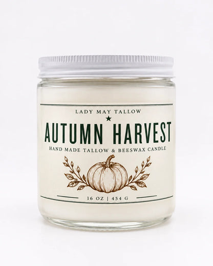 A 16 oz glass jar candle with a white lid and cream-colored label, featuring &