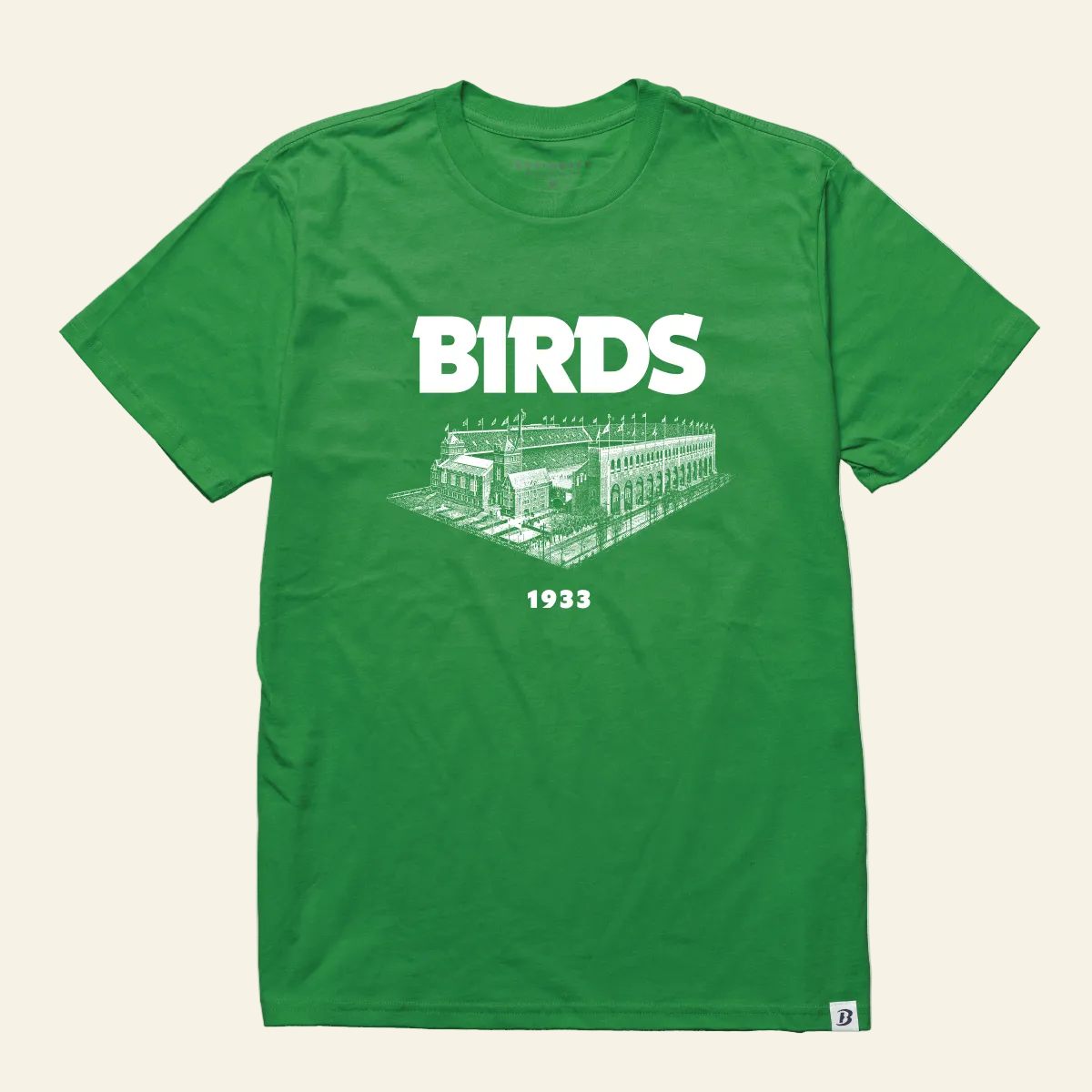 A green short-sleeve t-shirt with a white graphic print on the front featuring the word &