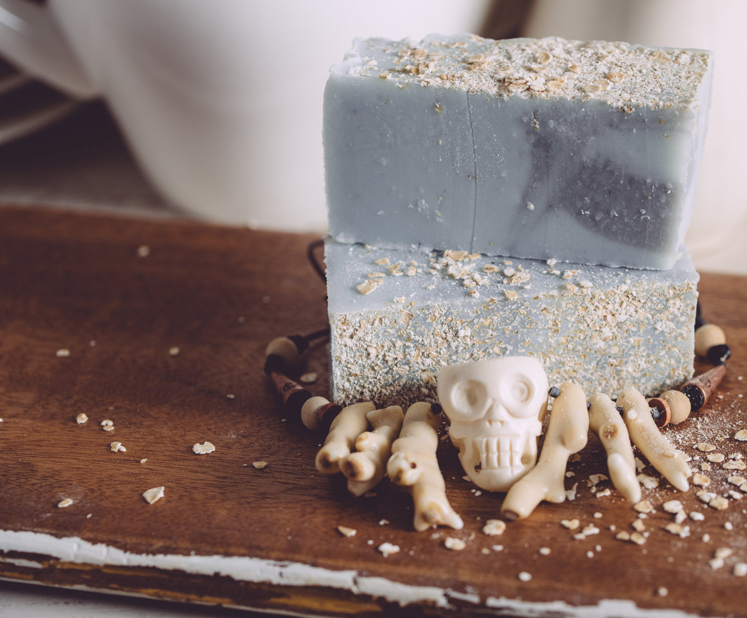 Decorative soap with skull design on a wooden surface