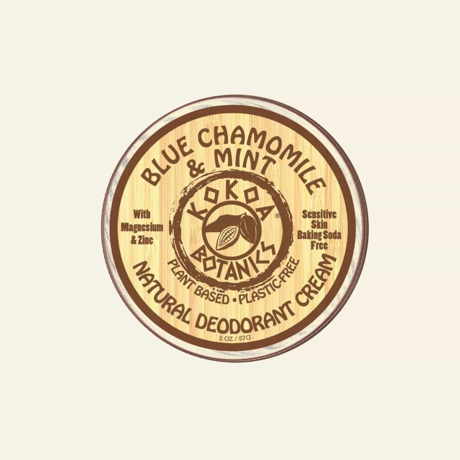 Koka Botanics natural deodorant cream container with wooden lid on a white background